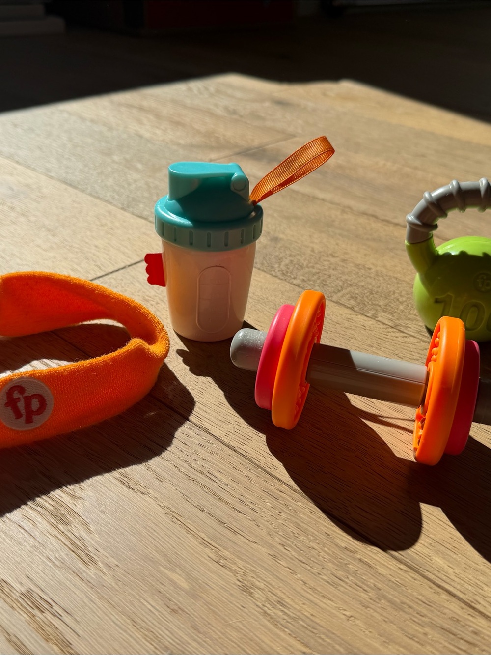 Fisher-Price Orange Headband and Colorful Play Rattle Workout Set